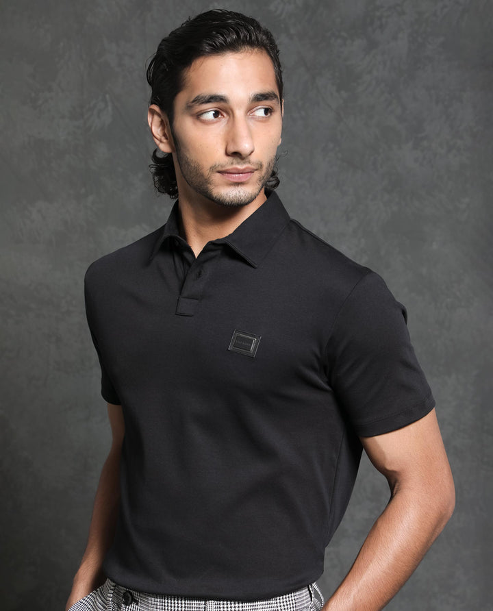 Rare Rabbit Men's Badger-1 Black Cotton Fabric Collared Neck Half Sleeves Solid Polo T-Shirt