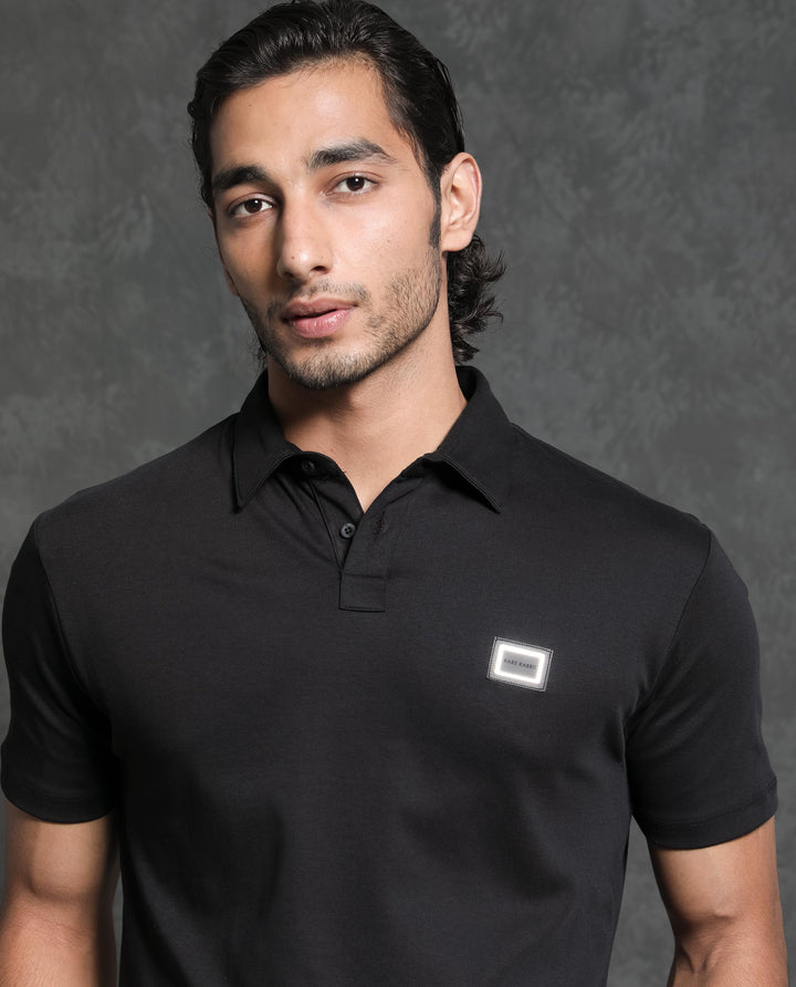 Rare Rabbit Men's Badger-1 Black Cotton Fabric Collared Neck Half Sleeves Solid Polo T-Shirt