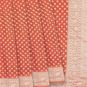 Rust Handwoven Khaddi Geirgette Silk Saree With Floral Motifs & Vine Motifs in Border-Rust