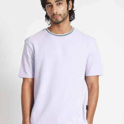 Rare Rabbit Men's Bueno Pastel Purple Solid Crew Neck Drop Shoulder With Contrast Detailing On The Neck Half Sleeves T-Shirt