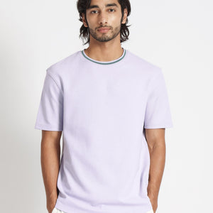 Rare Rabbit Men's Bueno Pastel Purple Solid Crew Neck Drop Shoulder With Contrast Detailing On The Neck Half Sleeves T-Shirt