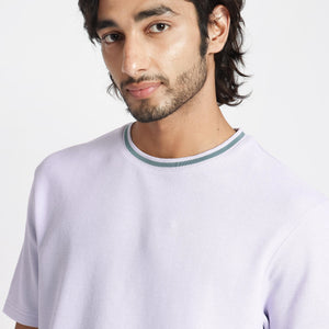 Rare Rabbit Men's Bueno Pastel Purple Solid Crew Neck Drop Shoulder With Contrast Detailing On The Neck Half Sleeves T-Shirt