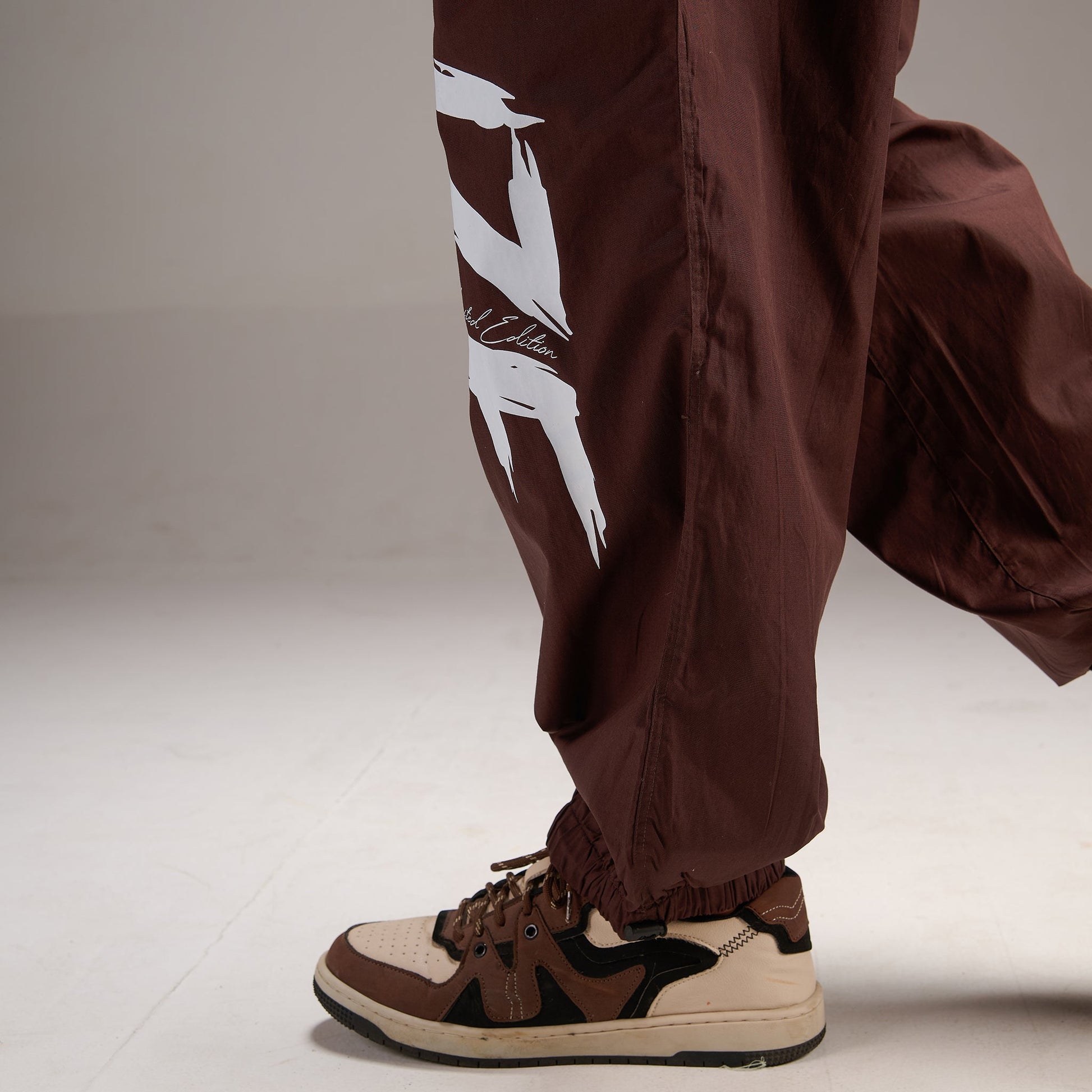 Printed "Limited edition" Parachute Pants for Men in Brown