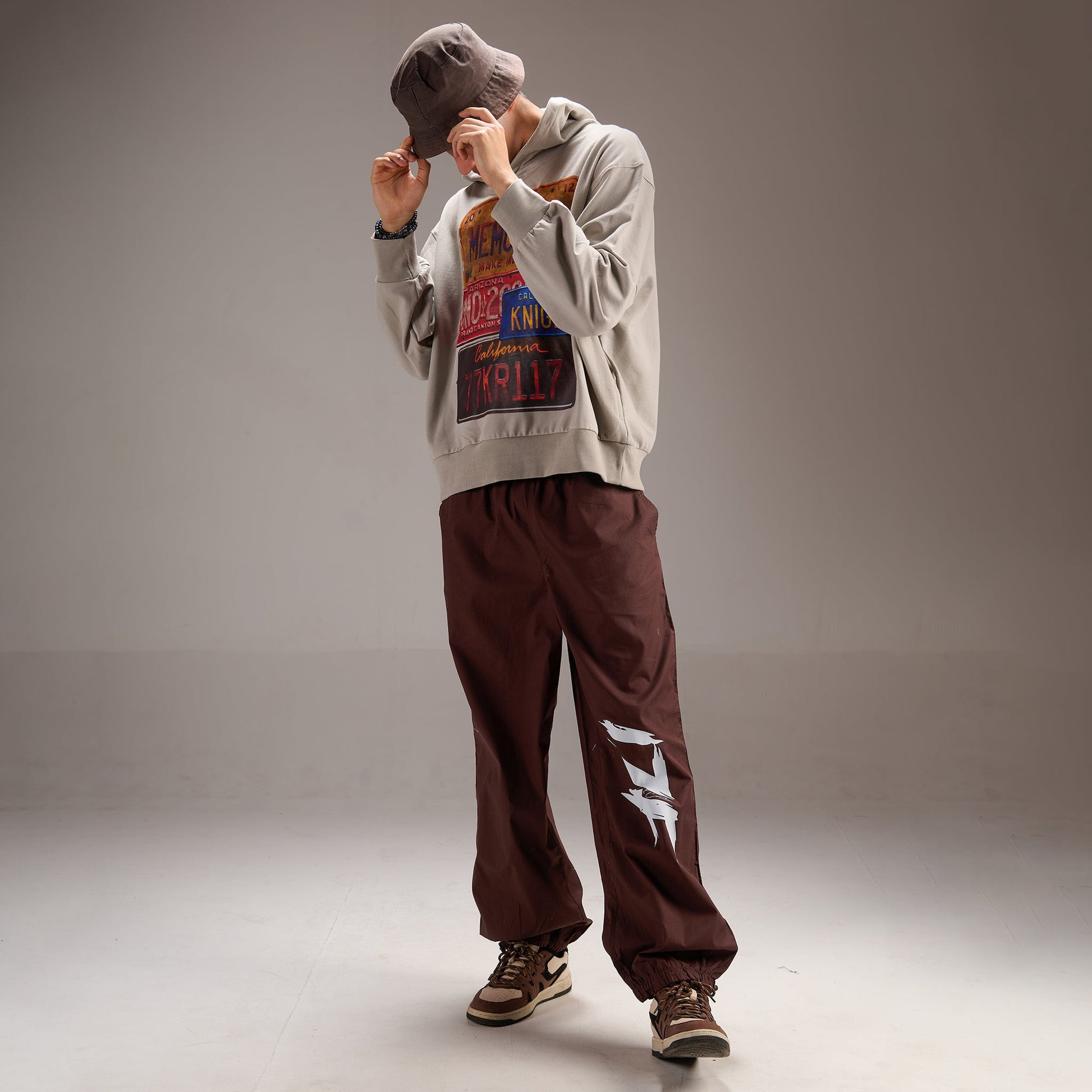 Printed "Limited edition" Parachute Pants for Men in Brown
