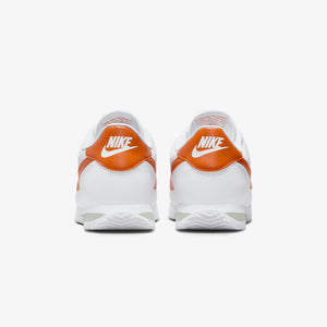 Nike | CORTEZ  { WHITE/CAMPFIRE ORANGE-JADE HORIZON