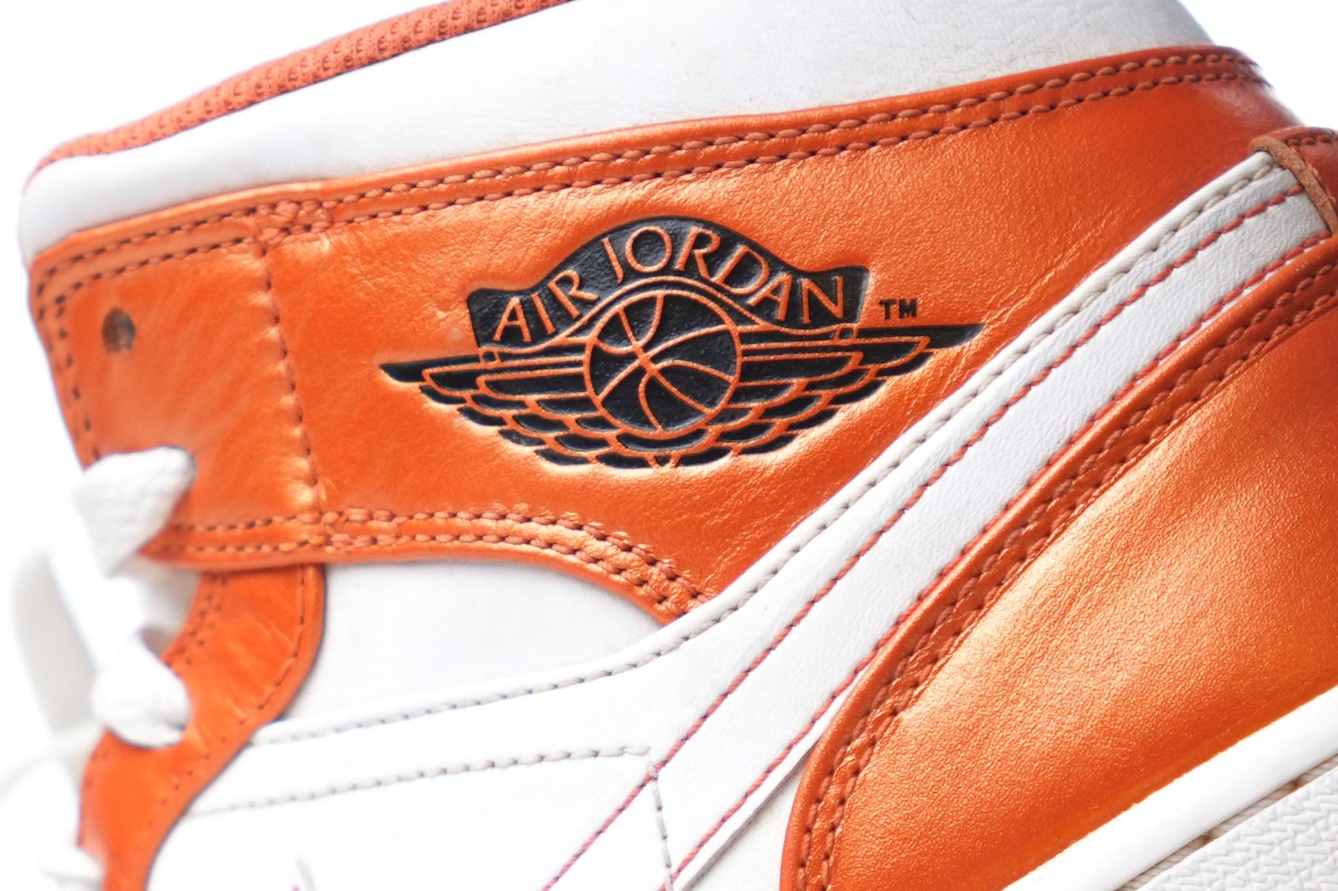 Nike Air Jordan 1 Mid SE Metallic Electro Orange And White Sneakers