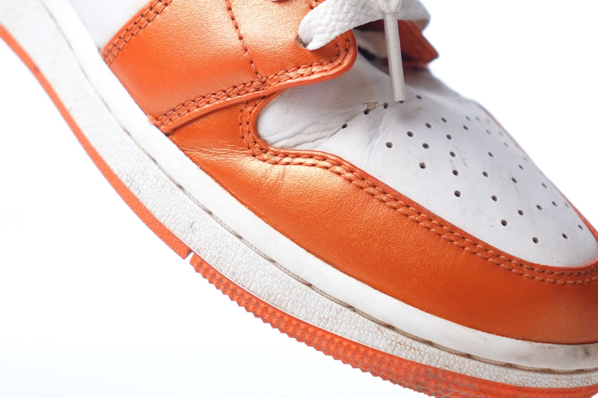 Nike Air Jordan 1 Mid SE Metallic Electro Orange And White Sneakers