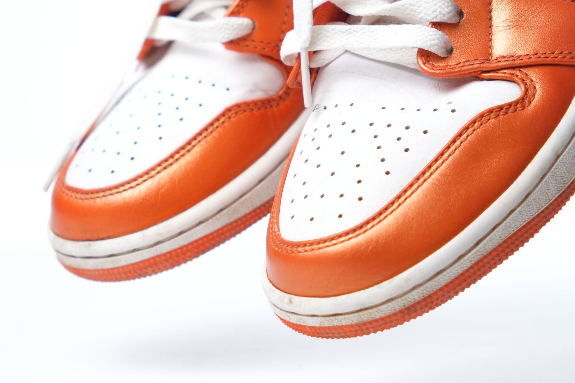 Nike Air Jordan 1 Mid SE Metallic Electro Orange And White Sneakers