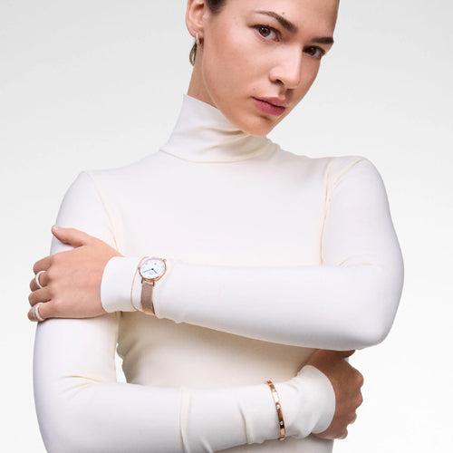Daniel Wellington Petite Roman Numerals Date Rose Gold White Dial Women 28mm DW00100856