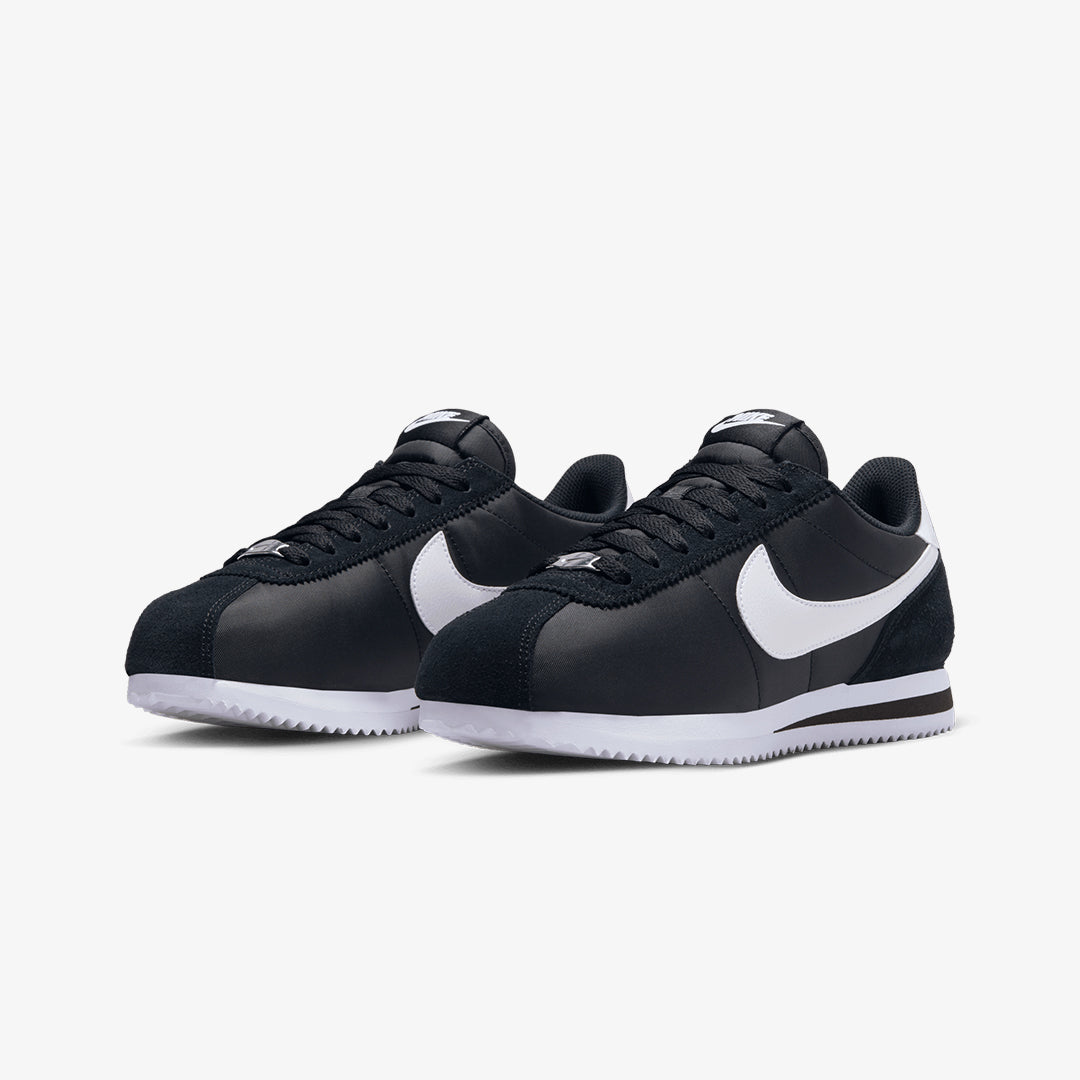 Nike | CORTEZ TXT  { BLACK/WHITE