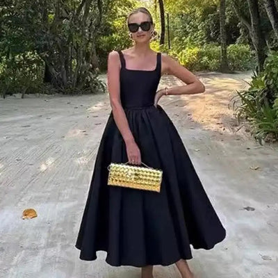 Rigata Holiday Statement Maxi Dress in Black