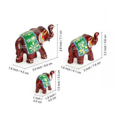 'Seven Tuskers In Maroon' Hand Carved & Handpainted Showpiece In Resin (Set of 7)