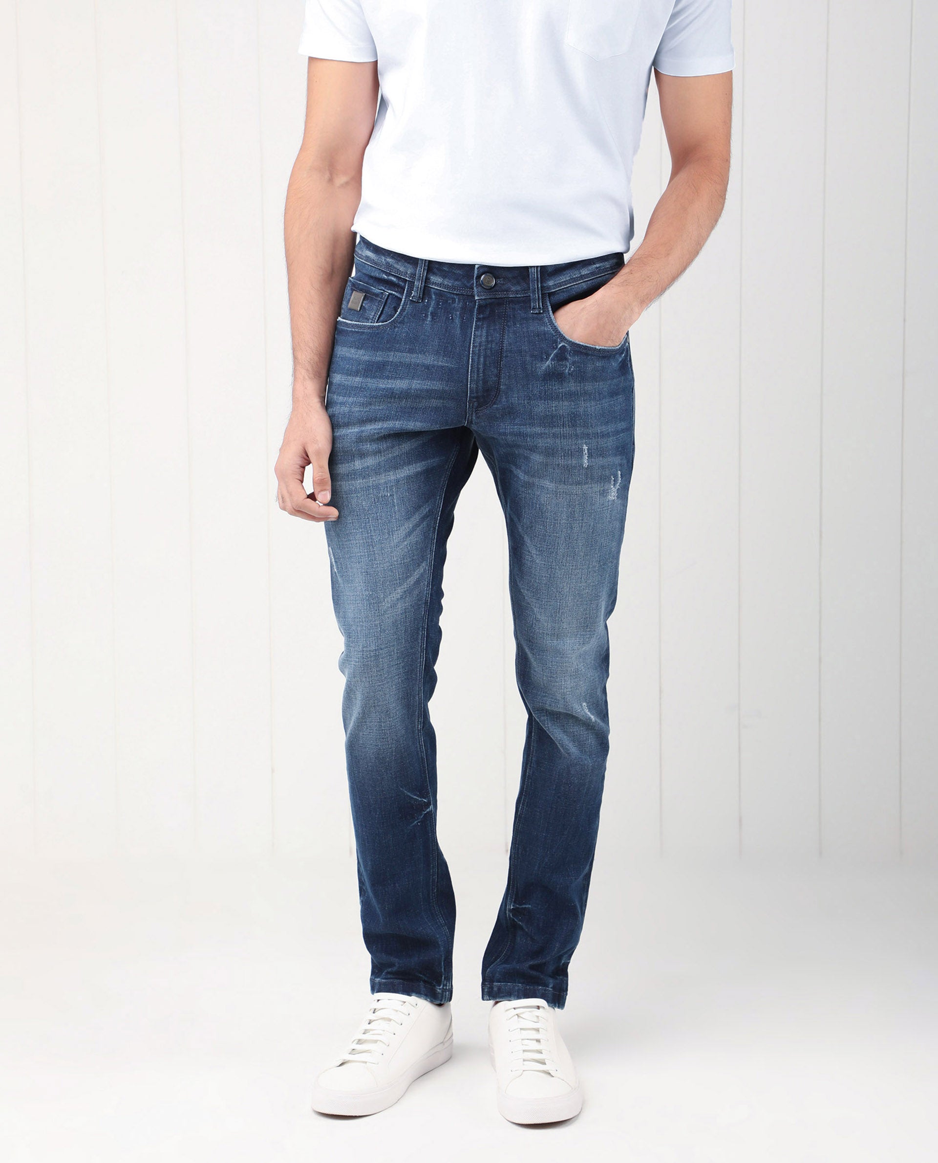 Rare Rabbit Men's Grimm Blue Mid Wash Mid-Rise Mild Distressed Slim Fit Jeans