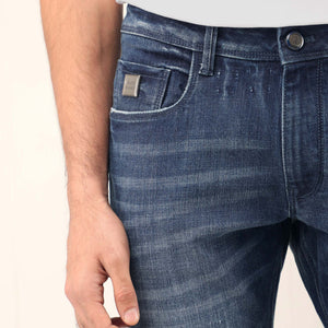 Rare Rabbit Men's Grimm Blue Mid Wash Mid-Rise Mild Distressed Slim Fit Jeans