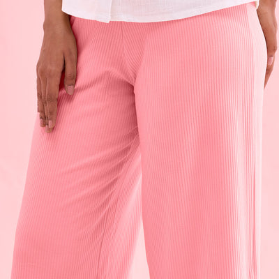 Women Solid Mauve Mid Rise Ribbed Palazzos