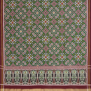 Forest Green Handwoven Ikat Silk Saree