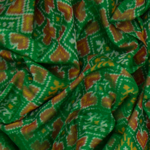 Green Handwoven Rajkot Patola Silk Saree With Diamond Motifs And Golden Zari Border-Green