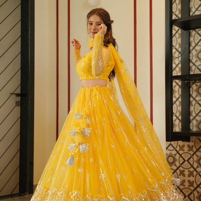 Aisha yellow net lehenga choli set