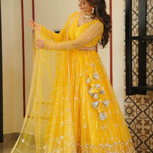 Aisha yellow net lehenga choli set
