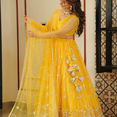 Aisha yellow net lehenga choli set