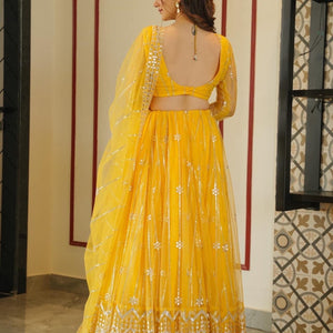 Aisha yellow net lehenga choli set