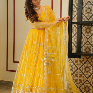 Aisha yellow net lehenga choli set
