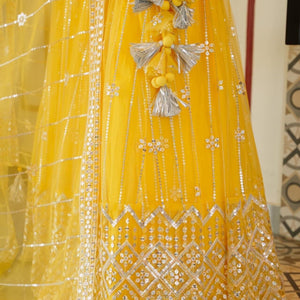 Aisha yellow net lehenga choli set