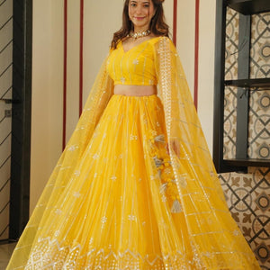 Aisha yellow net lehenga choli set