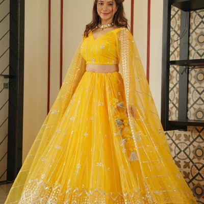 Aisha yellow net lehenga choli set