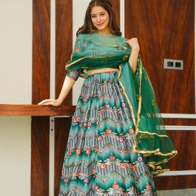 Green silk embroidered lehenga choli set