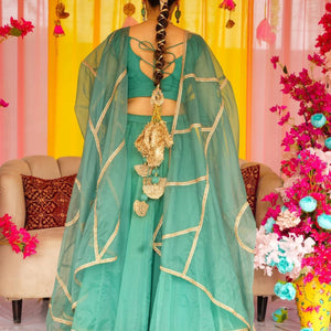 Sadhna green organza lehenga set