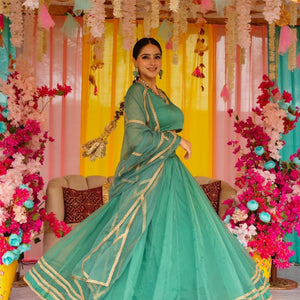 Sadhna green organza lehenga set