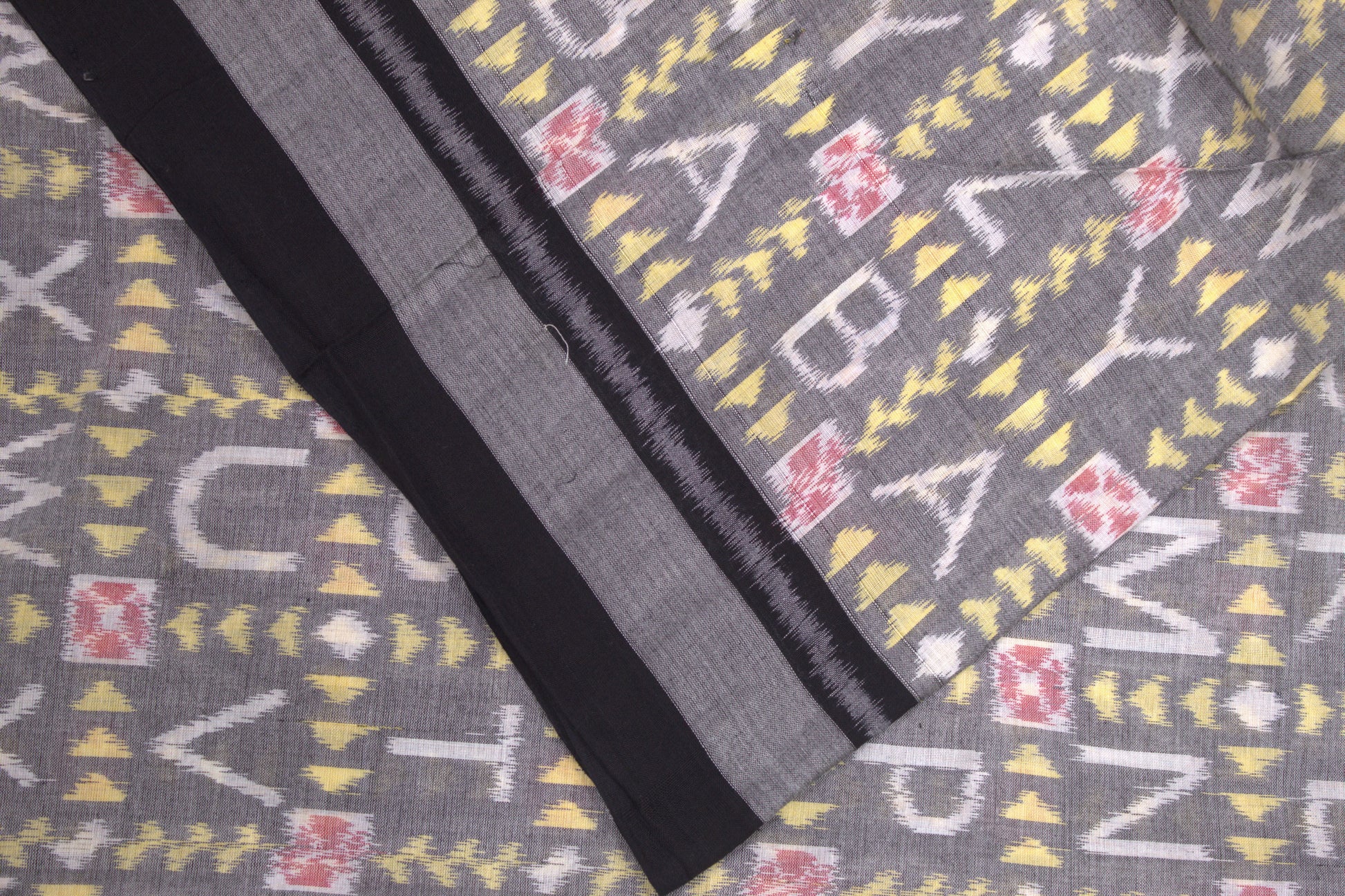 Light Black With White English Letter Design Sambalpuri Ikat Cotton Fabric