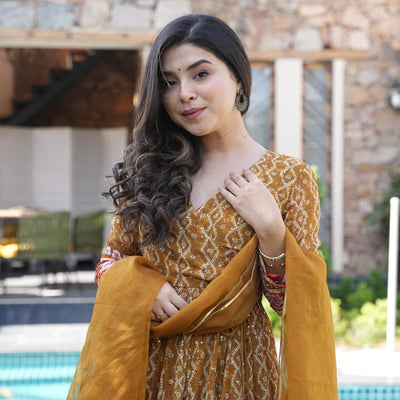 Gauri mustard embroidered suit set