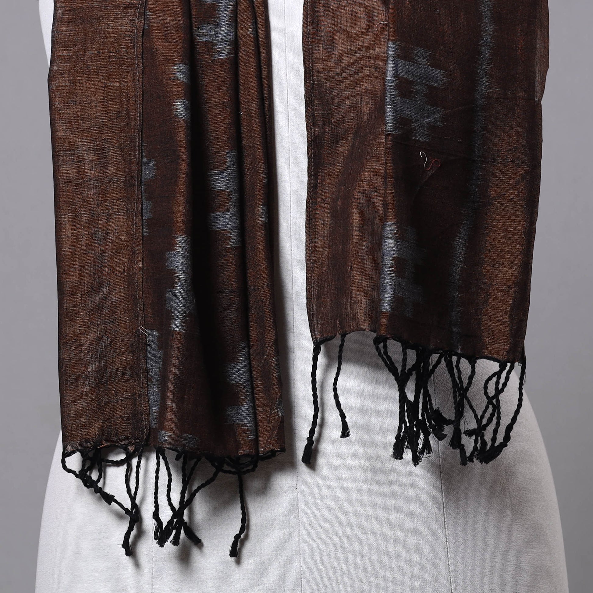 Brown - Maniabandha Ikat Weave Handloom Cotton Stole with Tassels
