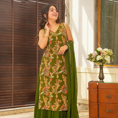 sakhi green heavy embroidered set