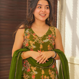 sakhi green heavy embroidered set