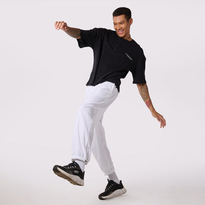 White Parachute pants & Black Textured knit top Set