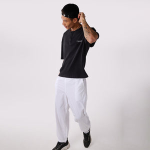White Parachute pants & Black Textured knit top Set