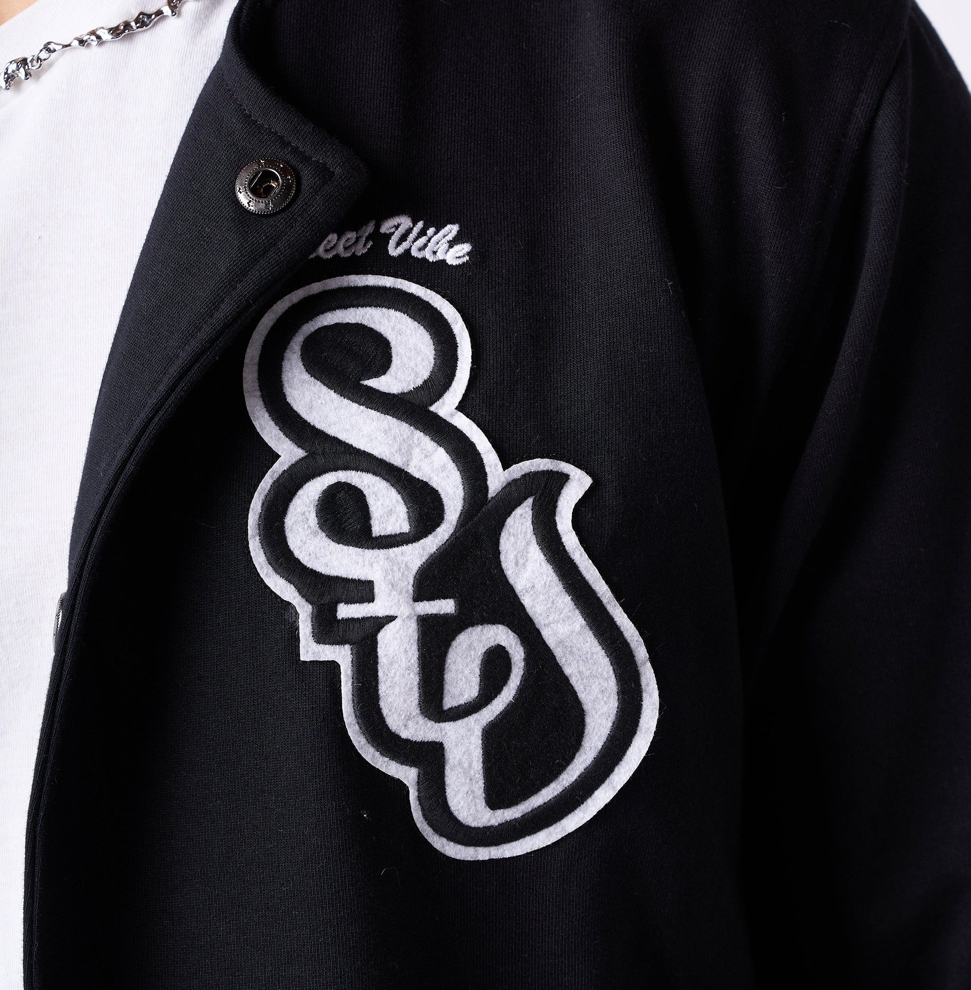 Black monochrome varsity jacket