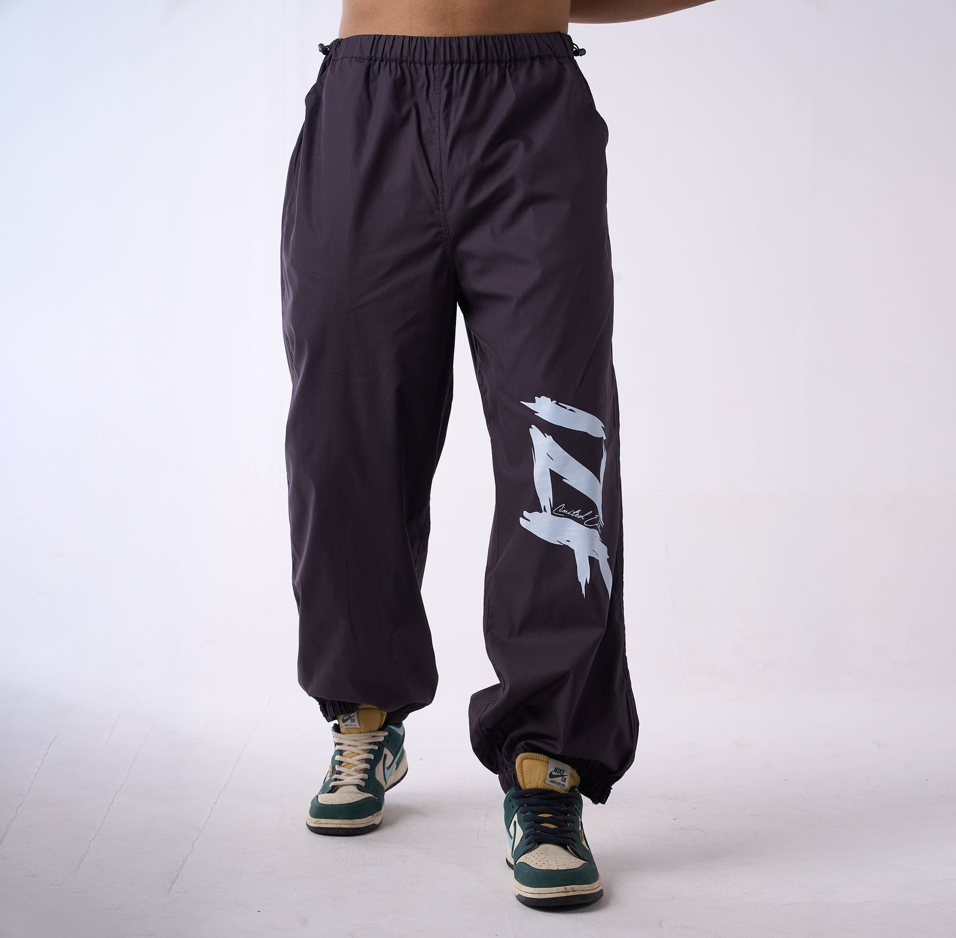 Printed "Limited edition" parachute pants