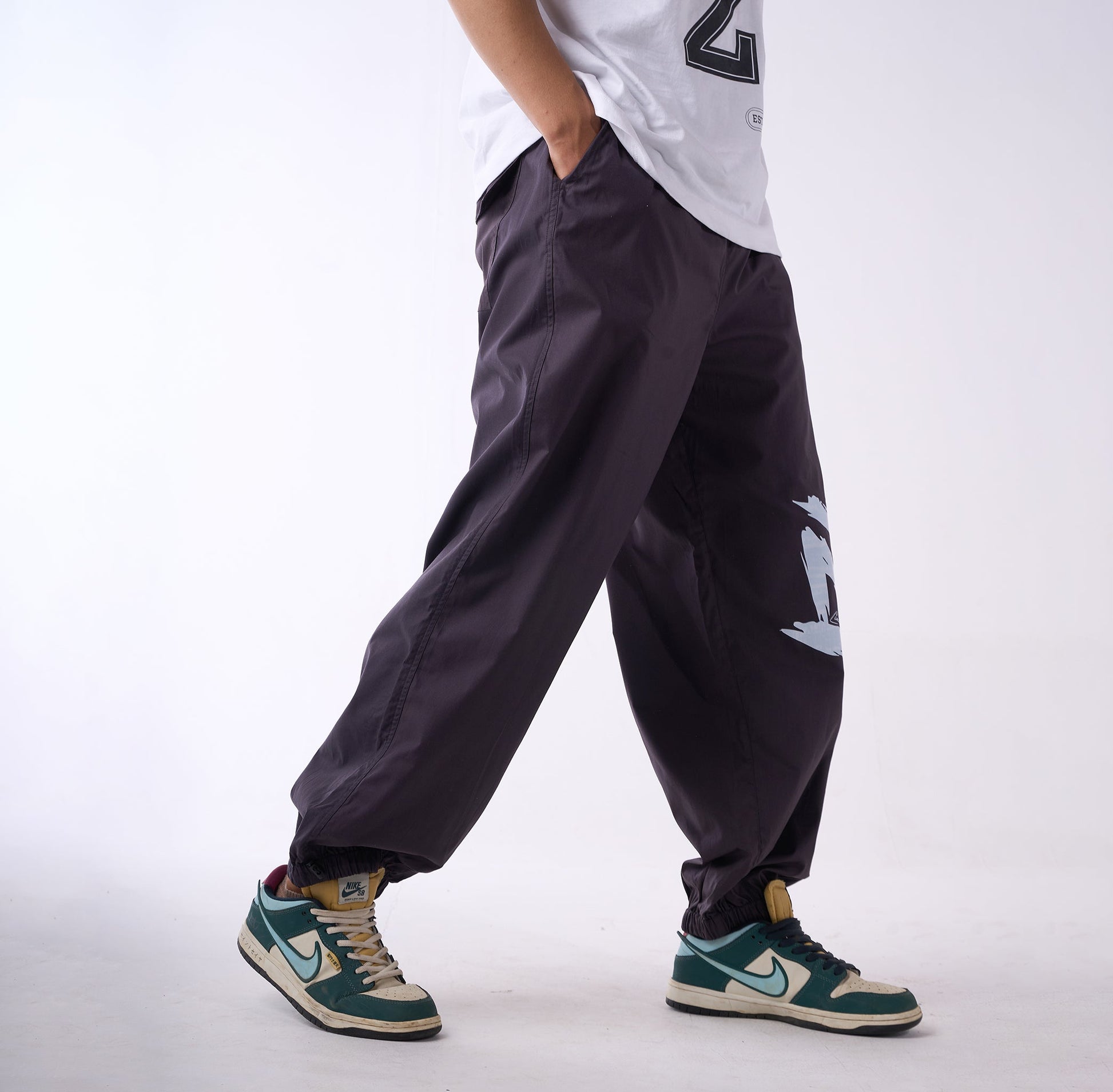 Printed "Limited edition" parachute pants