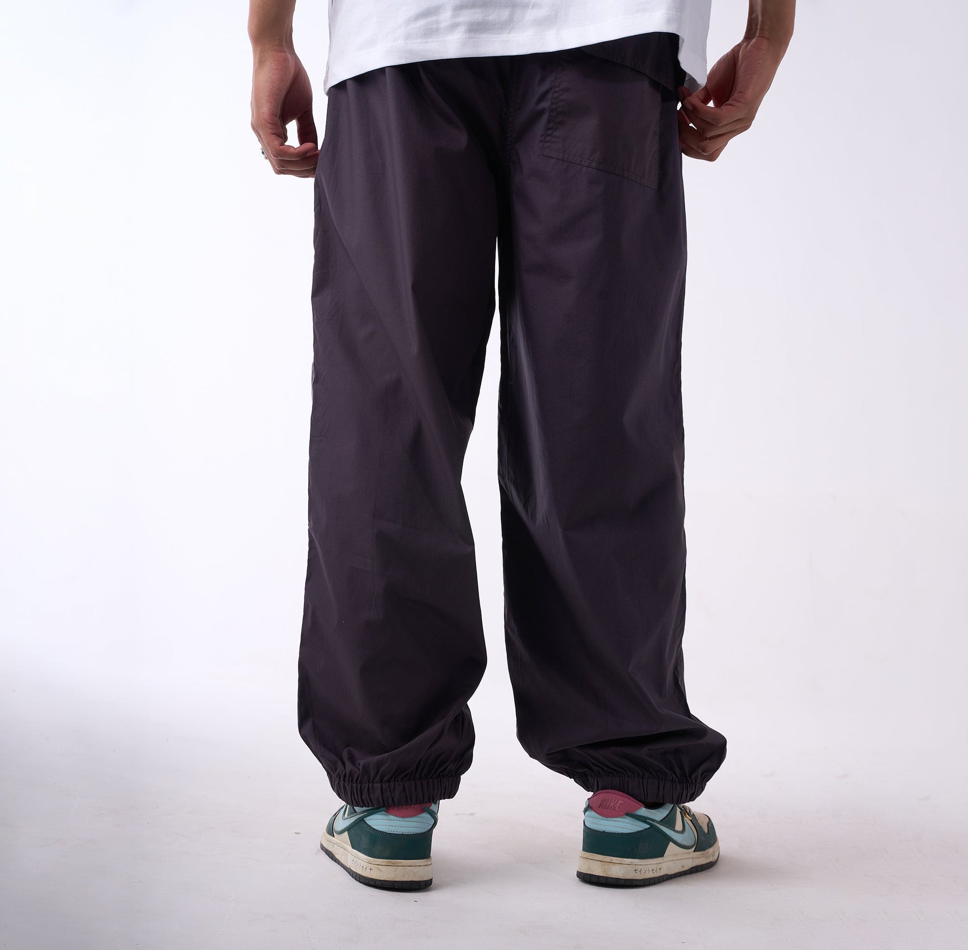 Printed "Limited edition" parachute pants