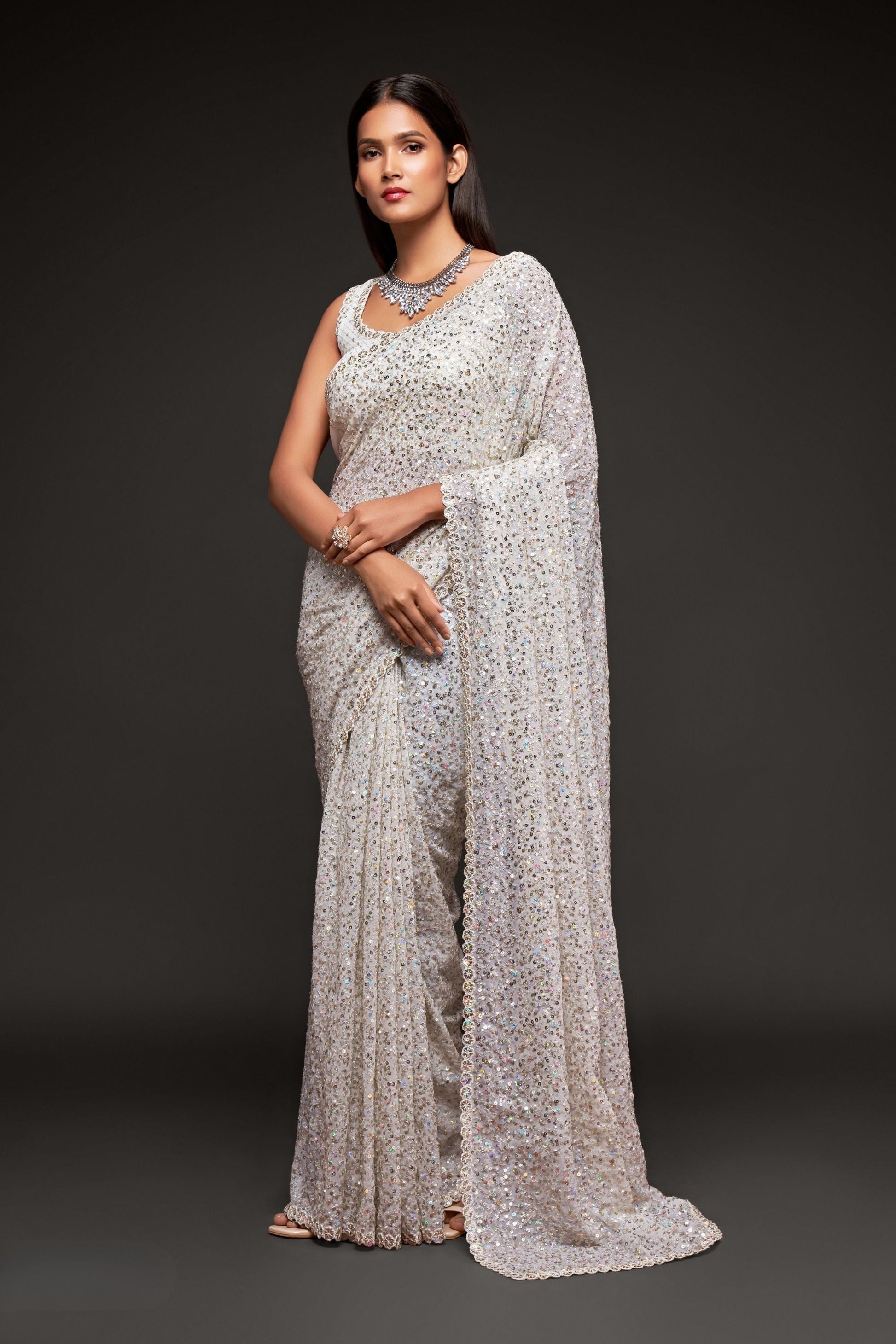 White Sequins Embroidered Heavy Saree In Georgette