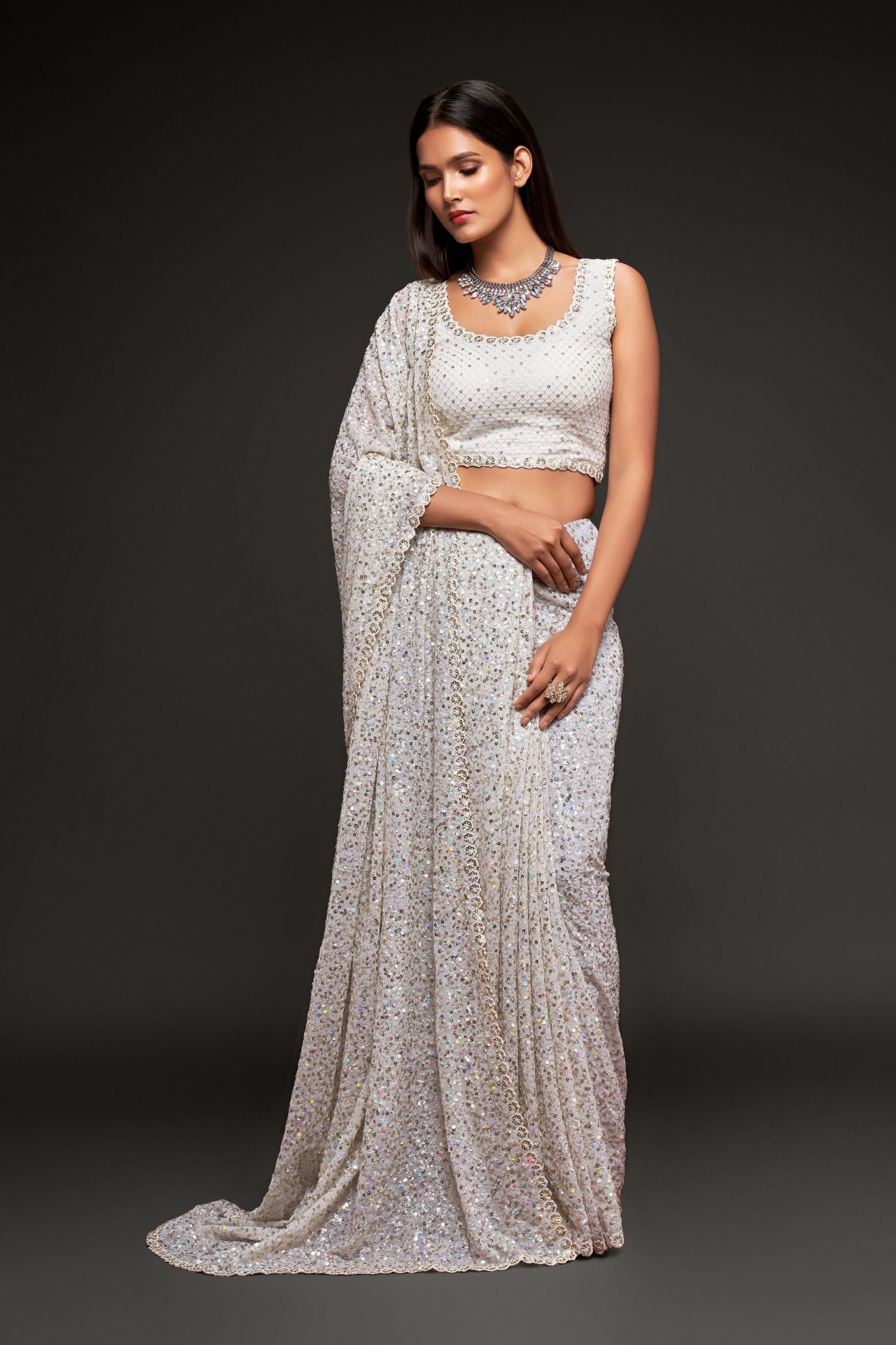 White Sequins Embroidered Heavy Saree In Georgette
