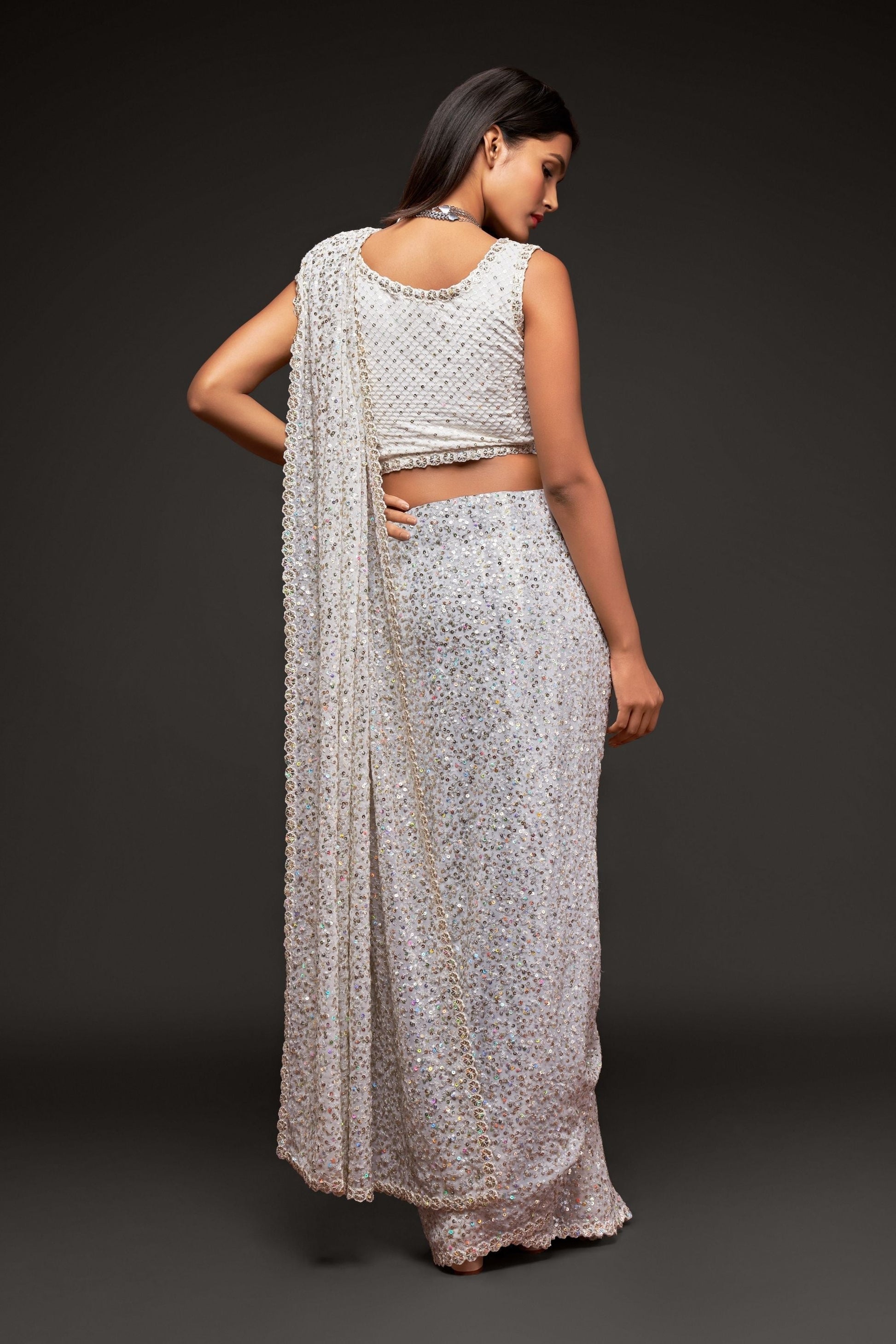 White Sequins Embroidered Heavy Saree In Georgette