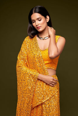 Yellow Sequined Georgette Saree For Party Wear