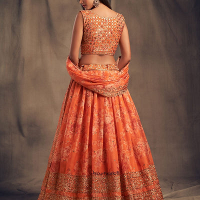 Graceful Blossom Printed Orange Organza Lehenga Choli