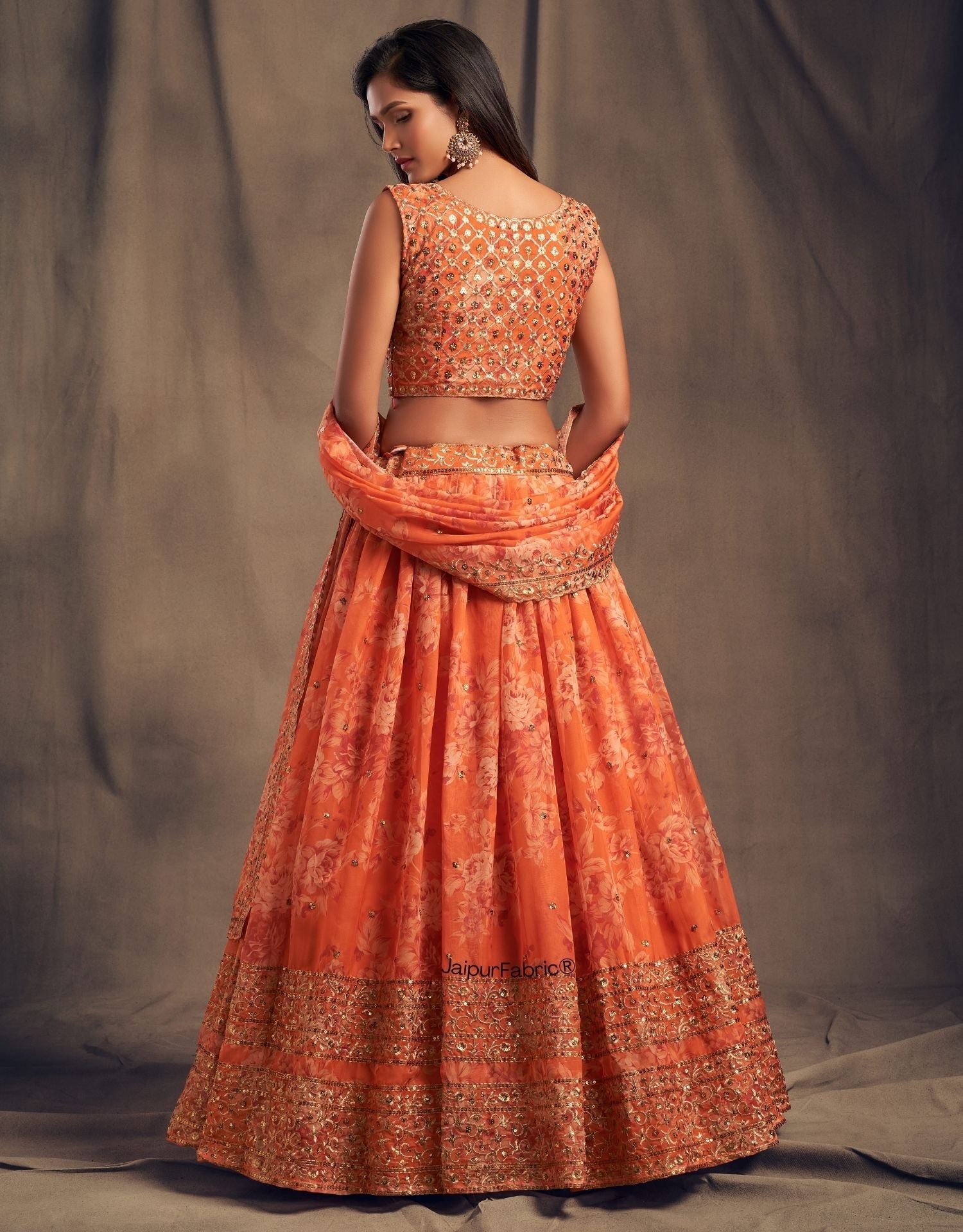 Graceful Blossom Printed Orange Organza Lehenga Choli