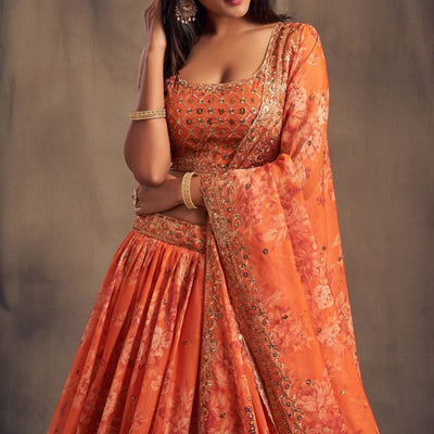 Graceful Blossom Printed Orange Organza Lehenga Choli